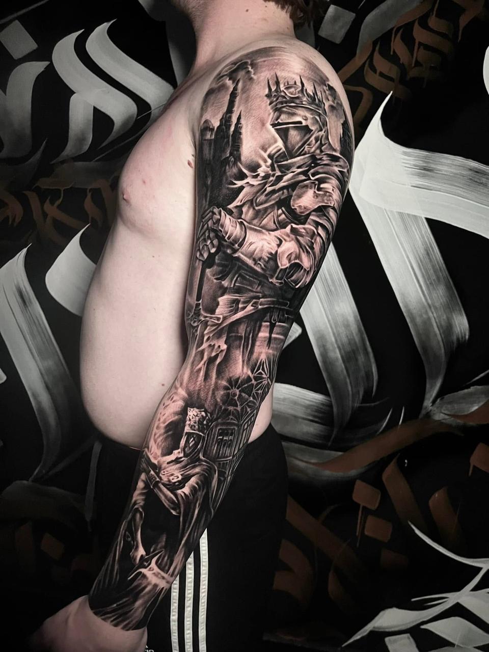 Black and grey realism sleeve — the level of detail we bring to every piece