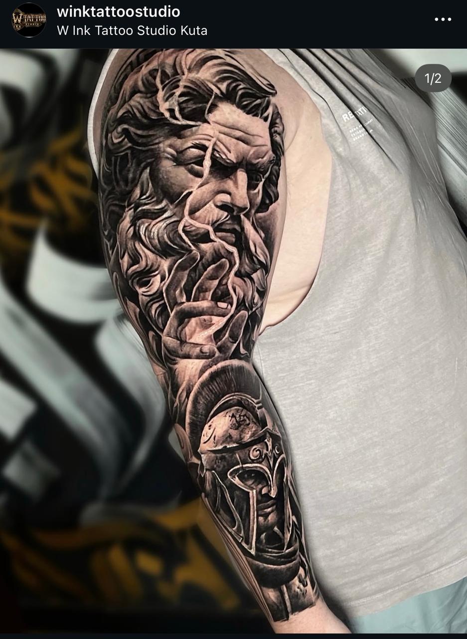 Black and grey realism Zeus and Spartan sleeve tattoo