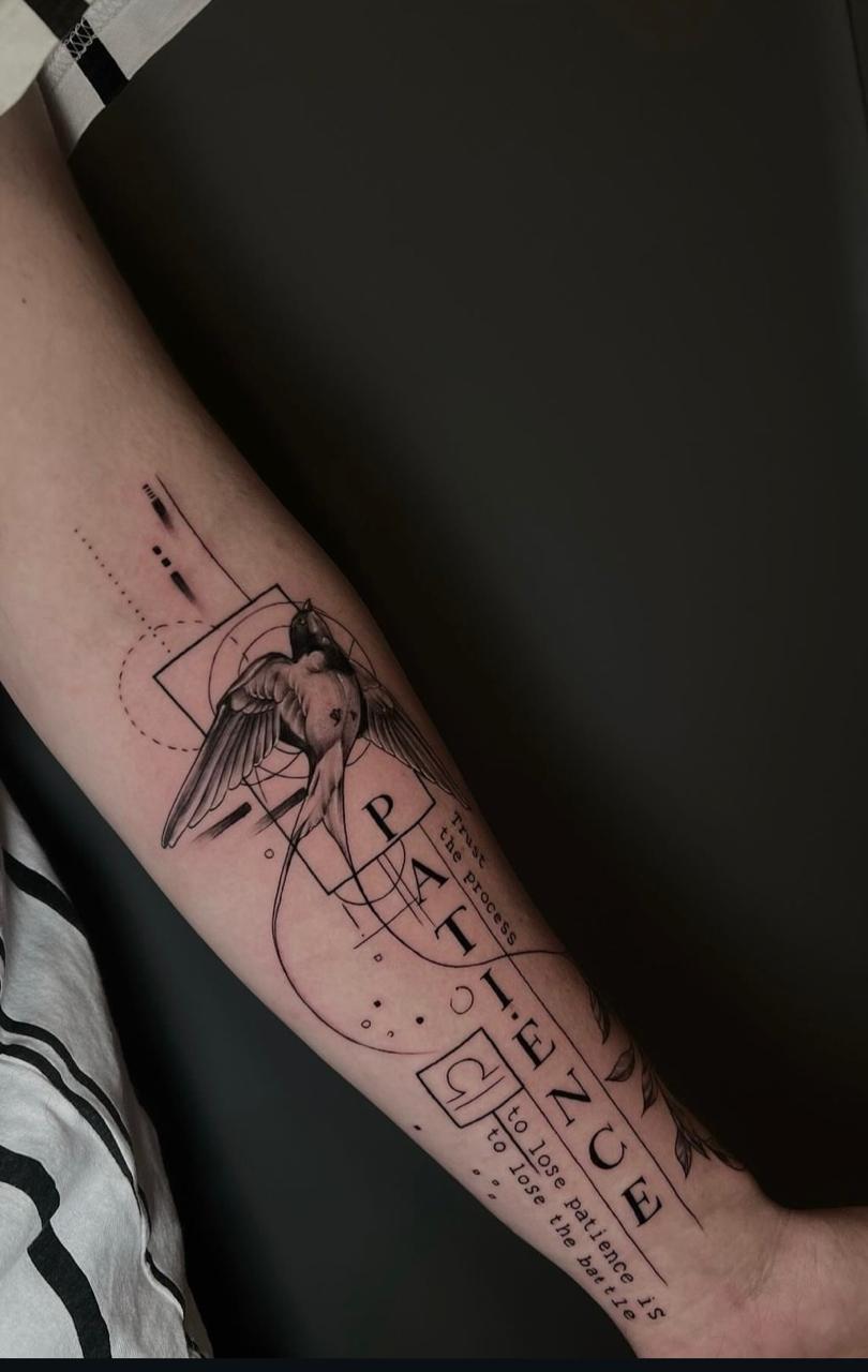 Fine line geometric swallow lettering tattoo